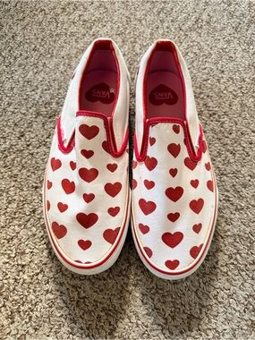 Vans White Slip-On Sneakers with Red Heart Print
